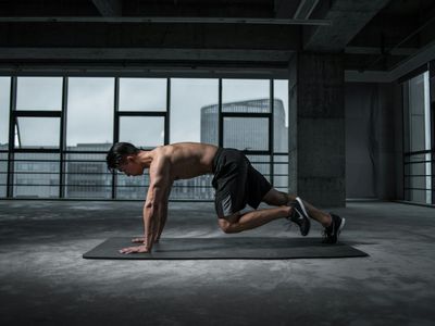 A person sitting calmly after a workout session.